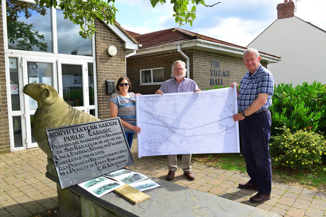 HERITAGE: David Wallace, Jeanette Newell and Fred Aitken with a map showing where the Barnard Castle to Bishop Auckland railway line crossed over the Haggerleases line and a warning sign that once stood at Lands Viaduct