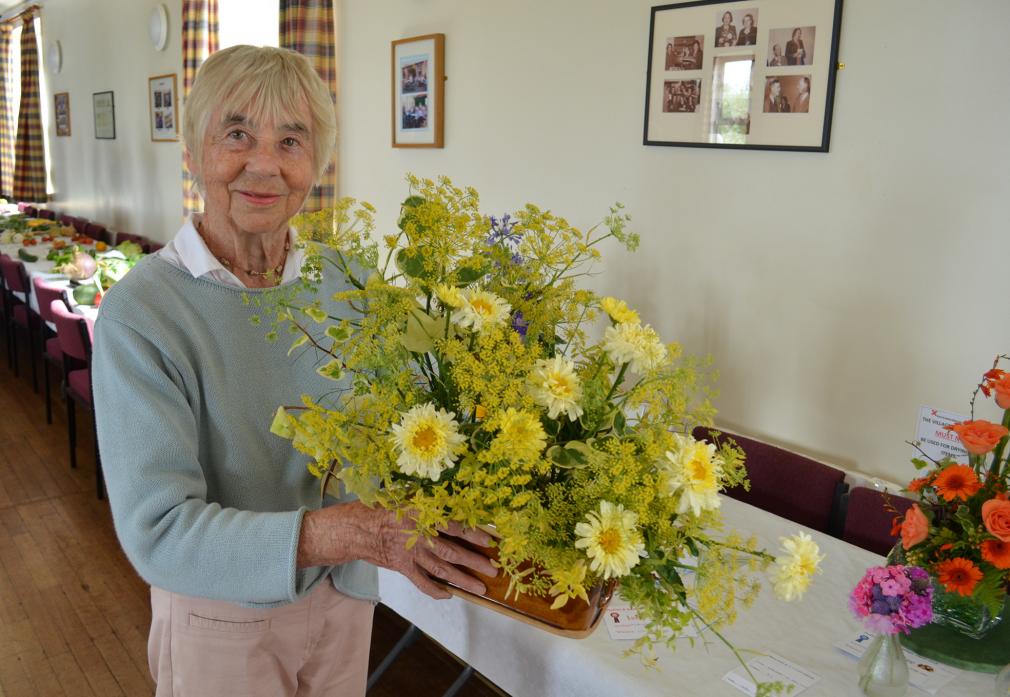 FLOWER POWER: Lilian Hay brought a splash of colour to the village hall with her display which was judged the best exhibit in flowers
