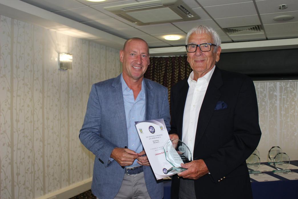 GREAT EFFORT: Raby Castle CC stalwart Bernard Poole, right, receives his award for Outstanding Service to Cricket from Durham CCC chief executive Tim Bostock