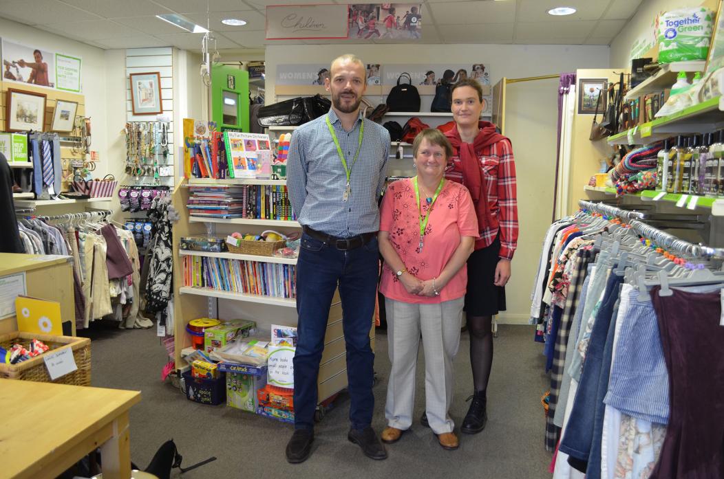 COME AND JOIN US: Barnard Castle’s Oxfam shop manager, Will Wearmouth, pictured with volunteers Angela Best and Caroline Cellier