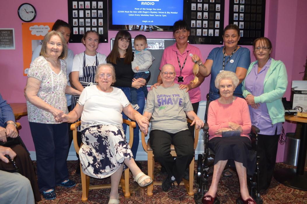 HAIR TODAY, GONE TOMORROW: Staff, residents, family and friends turned out to support Joyce Hodgson brave the shave for Macmillan Cancer Support at Lyons Court care home in Evenwood 	 TM pic