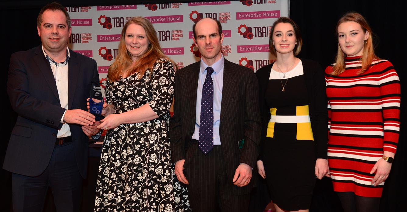 TOP NOTCH: Neil Anderson of CA Group presents Dawn and Charlie Trevor, Hannah Dunning and Charlotte Thresher of Equus Leather with the award for Best Business Trading Outside Teesdale