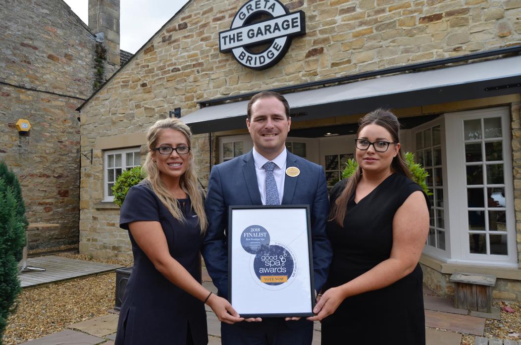 ALL BUBBLES AND SMILES: Morritt Arms Hotel manager Jonathan Cairns with Pippa Oakley and Amy Fell 								            TM pic