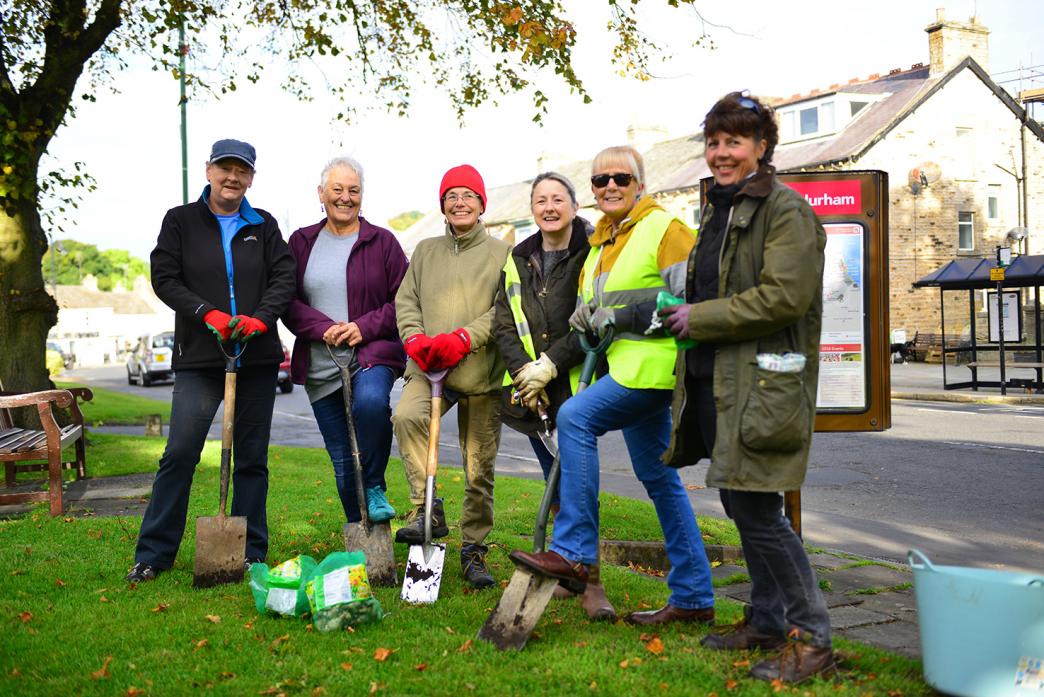 COMMUNITY SPIRIT: Lindsey Pepepall, Pam Phillips, Lesley Main, Chris Cartwright, Jo Lee and Jackie Farmer prepare to plant swathes of daffodils on Middleton-in-Teesdale's green