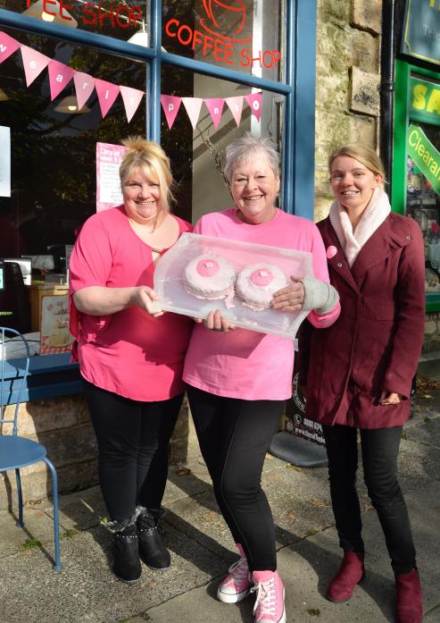 Cancer survivor Barbara Wright with her “booby cakes” outside Andalucia cafe, in Barnard Castle, with manager Claire Wolstenholme and her daughter Holly. Mrs Wright was raising awareness last week and is keen for other women to get checked out after suffe