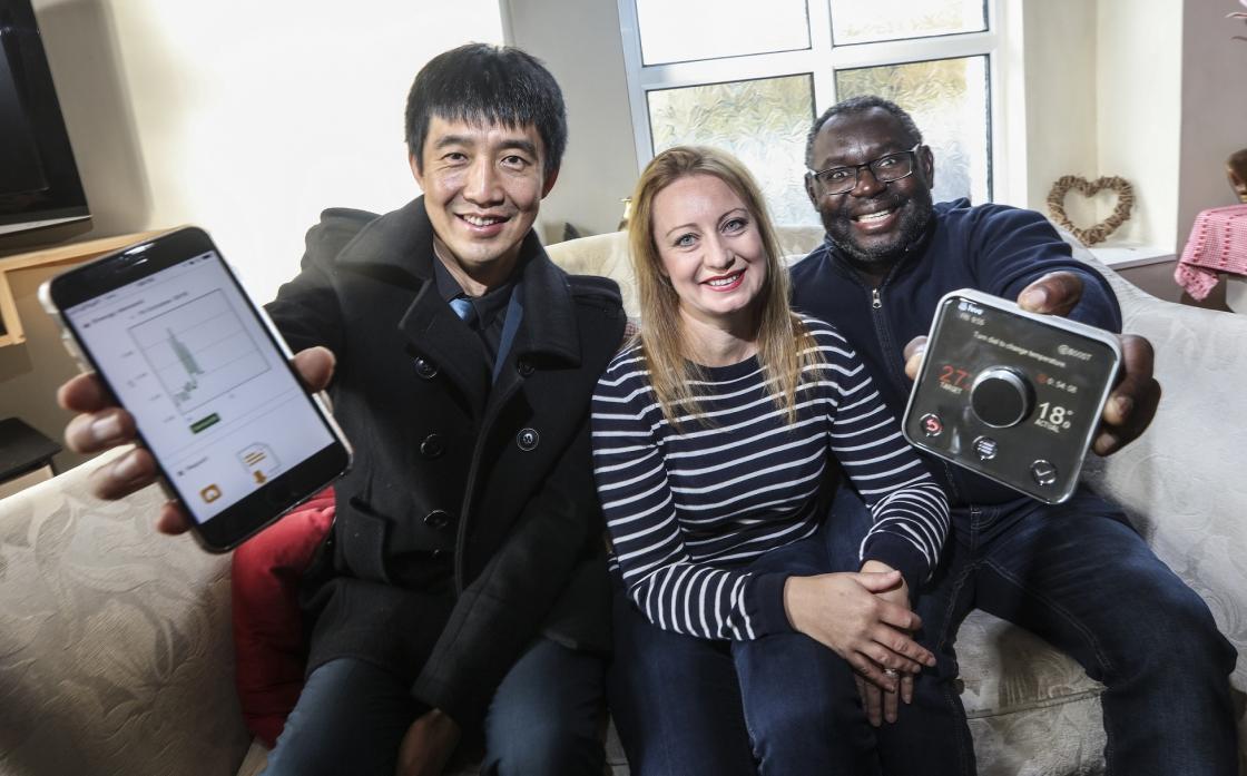 FREE INSULATION: Dr Hongjian Sun, from the project, with Chris and Taija Mutumbwa, from Ramshaw