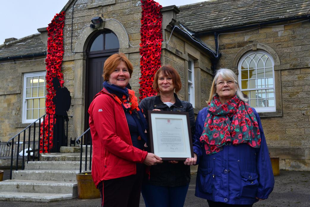 ROYAL LETTER: Stainton village hall committee members Amanda Pettitt, Debbie Williams and Sue Foulston with the letter from Balmoral Castle