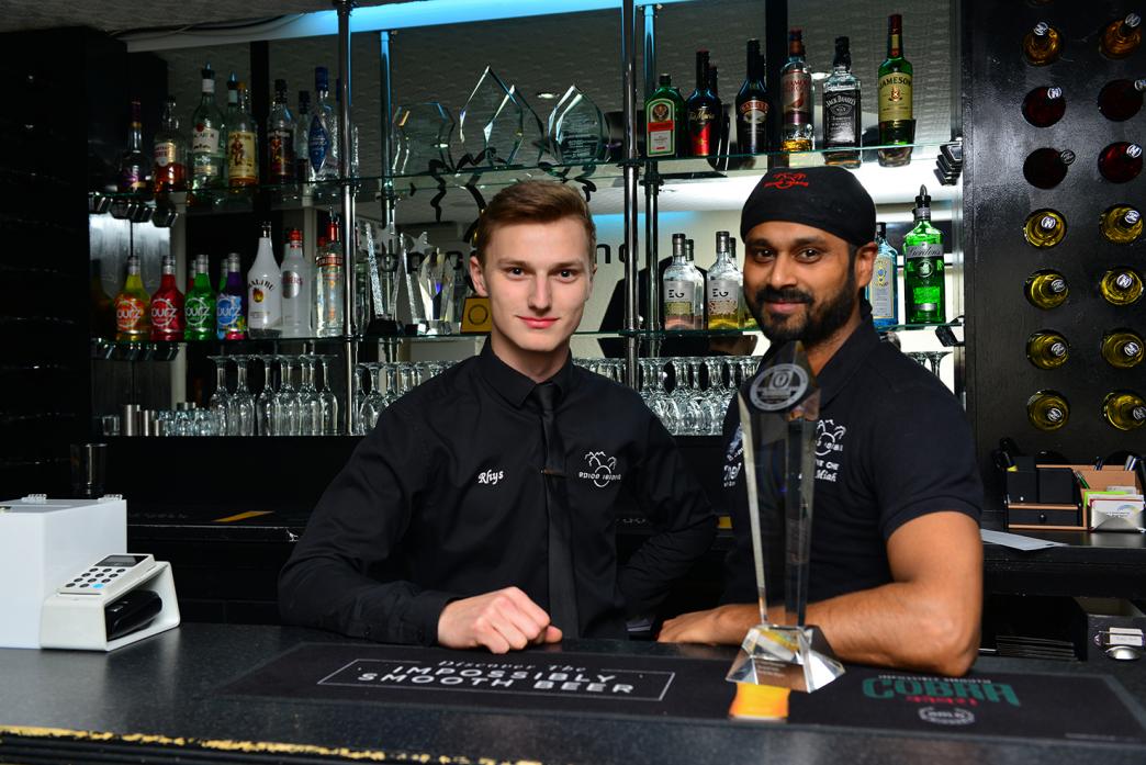 SECOND TO NAAN: Spice Island manager Rhys Keeling and chef Milon Miah with the BCA curry awards trophy they won in 2015. The restaurant is once again in the running for the title of best curry house in the country