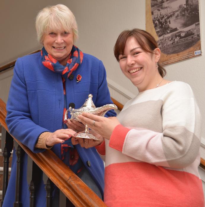 IT'S A KIND OF MAGIC: Mayor Sandra Moorhouse and Cllr Kelly Blissett – one of the stars of Aladdin – with the magic lamp up for grabs in the window dressing competition