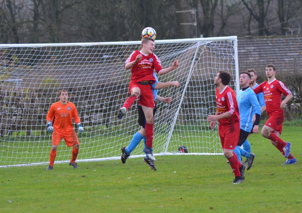 HEADS WE WIN: Tom Merryweather rises highest to score Bowes’ second goal in the Barnard Castle derby against Glaxo Rangers