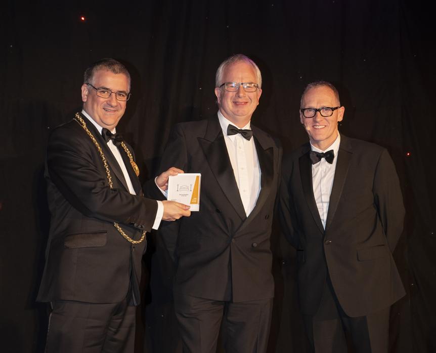 GOLD AWARD: Andrew Milnes receives the tourism award for Brunswick House B&B from South Tyneside mayor Ken Stephenson and BBC radio presenter Alfie Joey