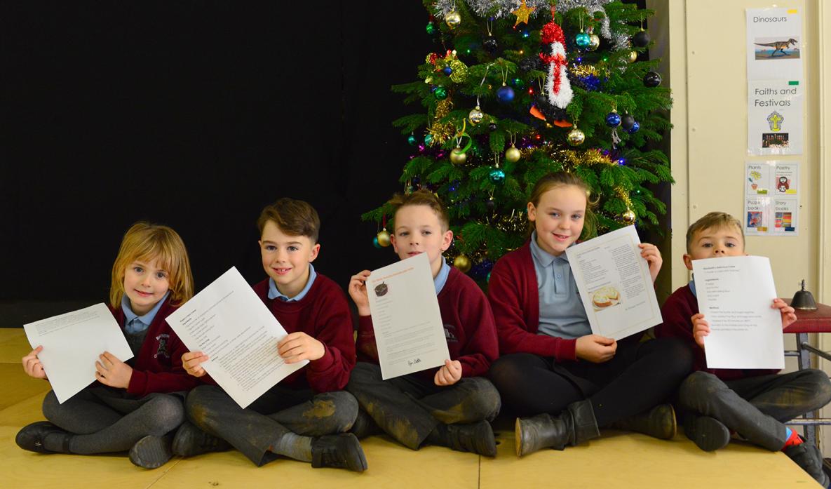 ON SALE: Elizabeth Dixon, Bertie Morris, Edward Dixon, Morgan Monteith and Louis Morris with some of the delicious recipes that will appear in their school's cookbook