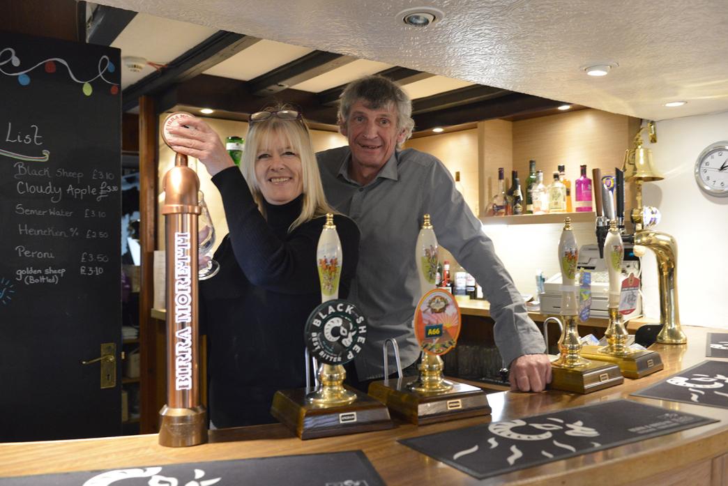 CHEERS: Brigette Martin and Brian Metcalfe are determined Ravensworth's Bay Horse Inn will be a traditional pub