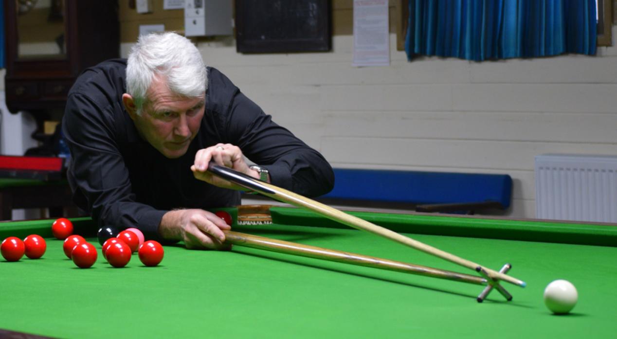 RIGHT ON CUE: Charles Blake in action. He took the Ken Coates Trophy for the third year in a row, defeating David Dye 4-1 in the final