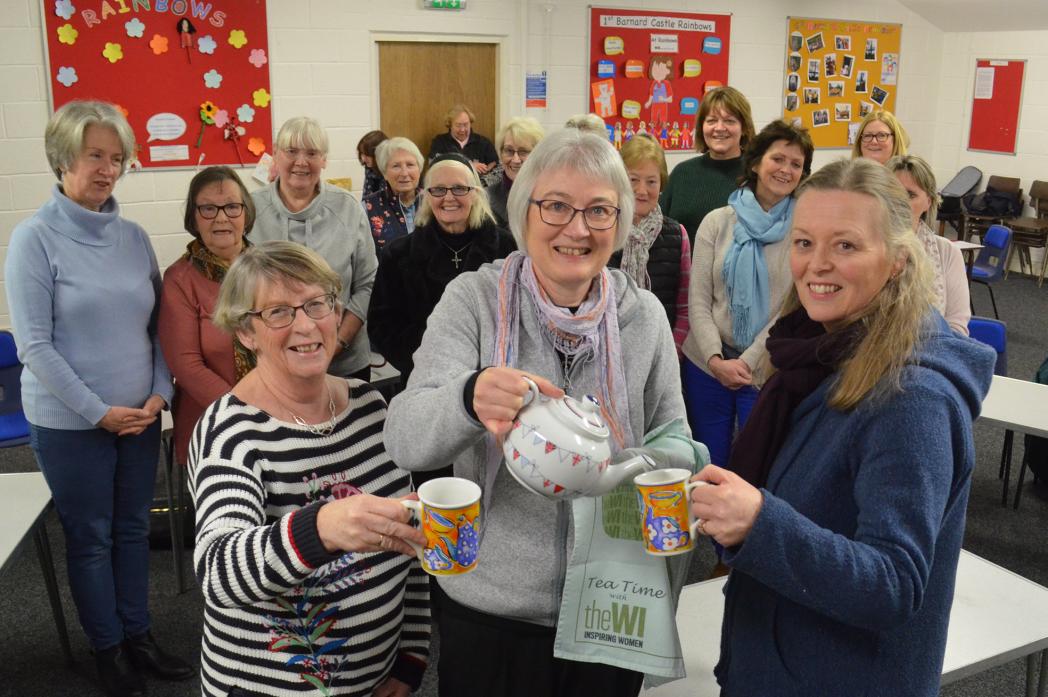 COME AND JOIN US: Barnard Castle WI secretary Sheila Jones brews up for Christine Thistlethwaite, left, and Ann Gill.