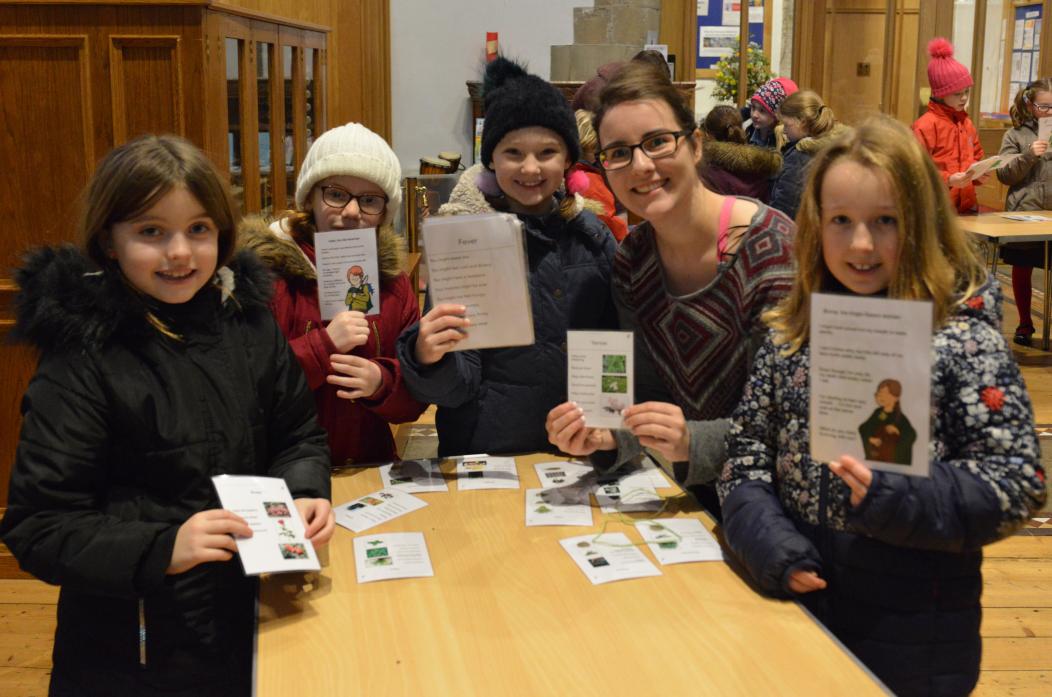 LEARNING: Amy, Charlotte, Emily and Chloe of St Mary's RC Primary School  with community archaeologist Harriet Tatton