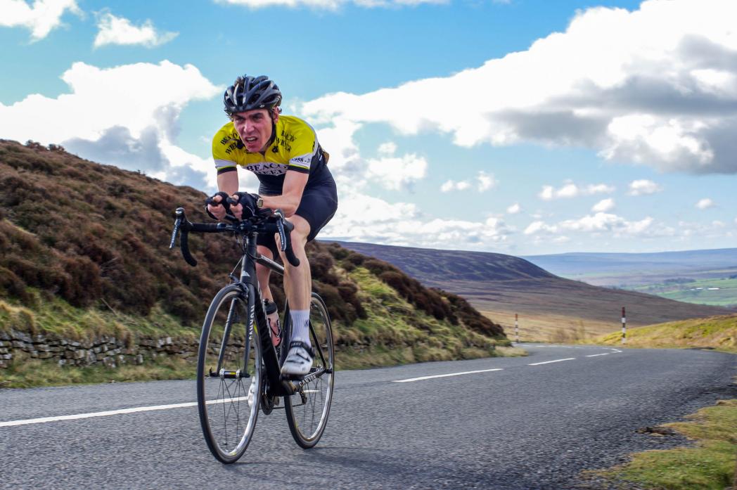 CLIMB: A cyclist taking part in a Teesdale time trial without closed roads. A much bigger event will mean major roads are closed