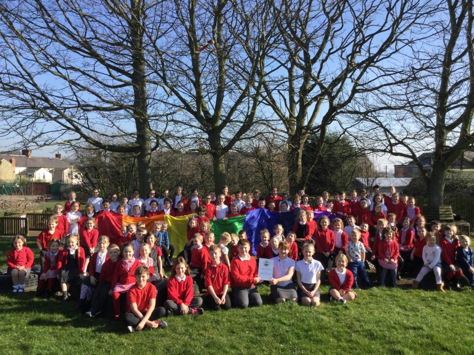 DIVERSE SCHOOL: Pupils at Cockfield Primary School with a rainbow flag