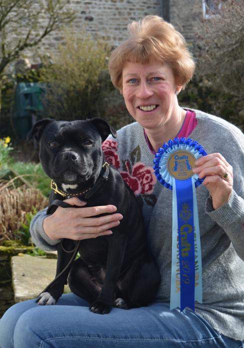 WHO’S A CLEVER GIRL? Sandra Lockey, from Barnard Castle, was one of a number of dog owners to return from last weekend’s Crufts show with a rosette. Her four-year-old Staffordshire bull terrier, Ava, picked up a second place.