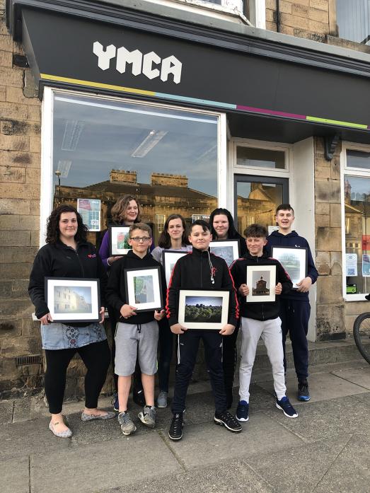 Young people from Teesdale YMCA with some of their photographs that will go on display at The Witham, in Barnard Castle