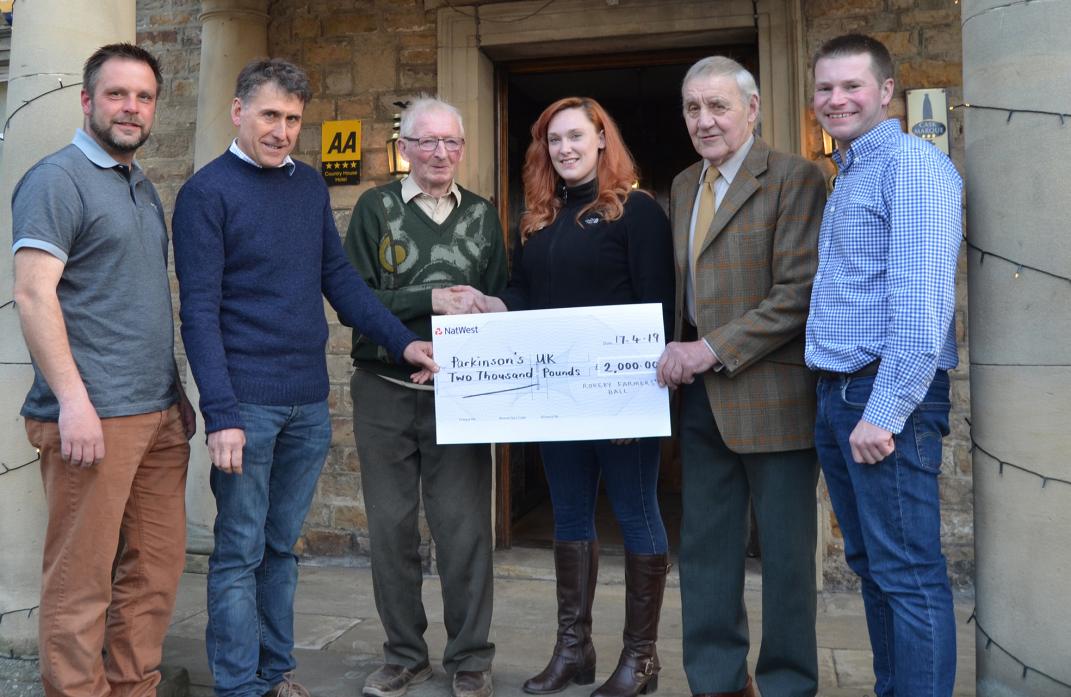 GOOD CAUSE: Jasmine Danby, centre, from Parkinson’s UK, with members of Rokeby Farmers’ Ball committee. From the left: Rob Walton, Andrew Watson, chairman Dougie Anderson, John Hare and Jonathan Wallis
