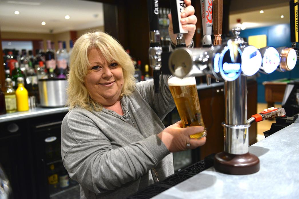 CHEERS: Tavern manager Karen Marley is eager to pull a pint for local people as well as holiday makers at River View Caravan Park					             TM pic