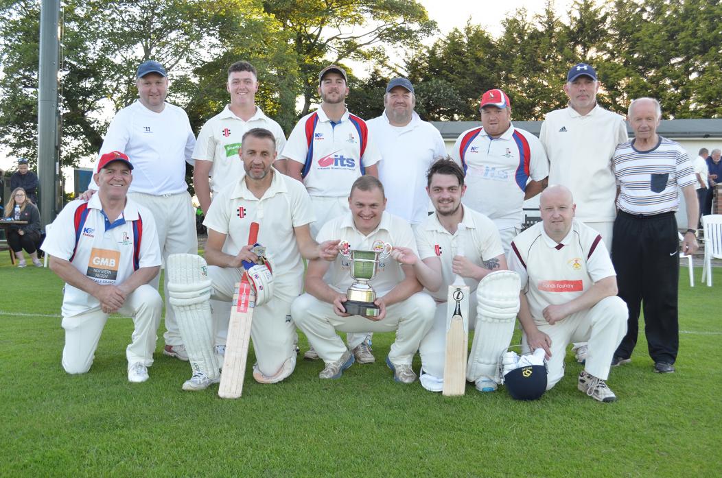 ALL SMILES: Skipper Craig Talbot holds the Darlington and District C Division Knockout cup after Lands’ ten wicket win against Middleton Tyas