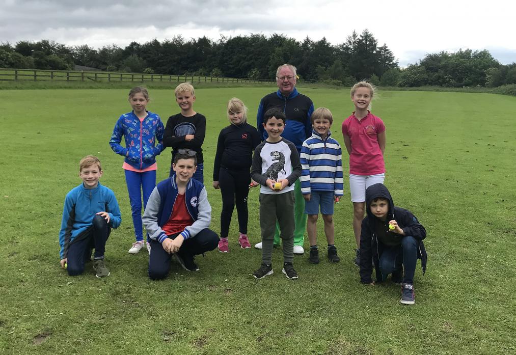 YOUNG STARS: Club captain Ross Law with academy members who took part in a competition won by Ramona Smith (front, centre).  Junior coaching is available from pro Darren Pearce or his assistant Peter Hartley