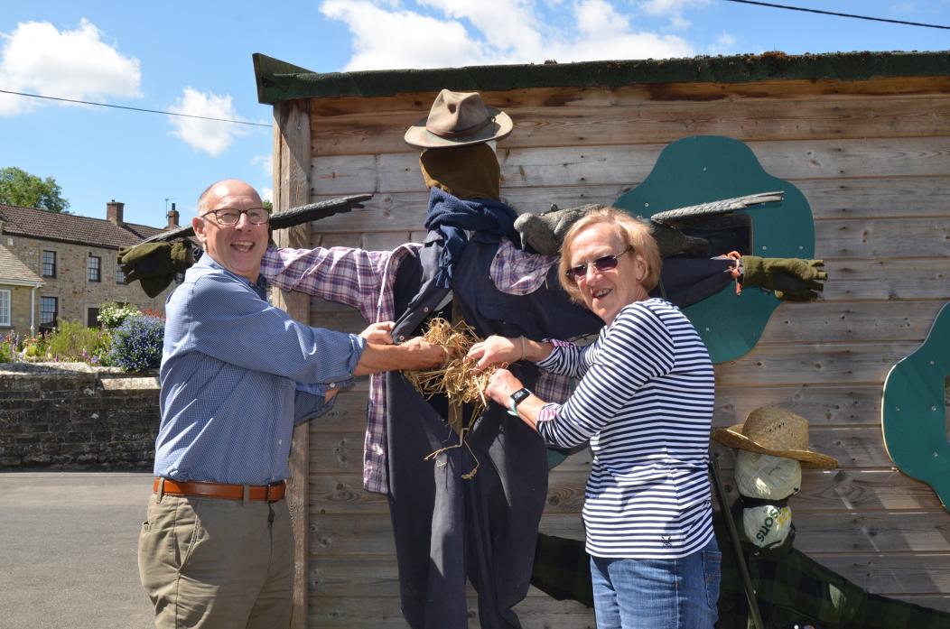 SCARY STUFF:  Startforth Community Centre committee members John Rhodes and Judith Rodwell putting the finishing touches to one of the scarecrows