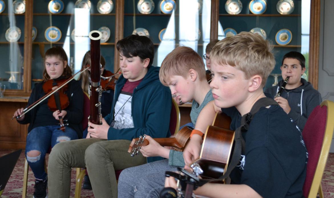 TUNING UP: Members of the dale’s youth folk group Cream Tees perform at The Bowes Museum