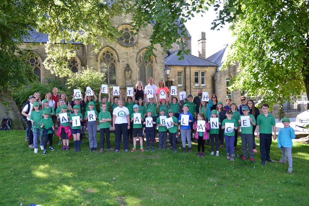 BEST FOOT FORWARD:Teachers and pupils from Cotherstone Primary School, prepare to embark on their five mile walk from Scar Top, in Barnard Castle, back to their school in aid of the Great North Air Ambulance Service