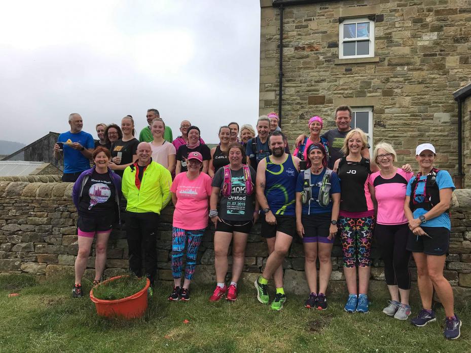 STRIDING OUT: Runners who took part in the fundraising run from Tan Hill Inn