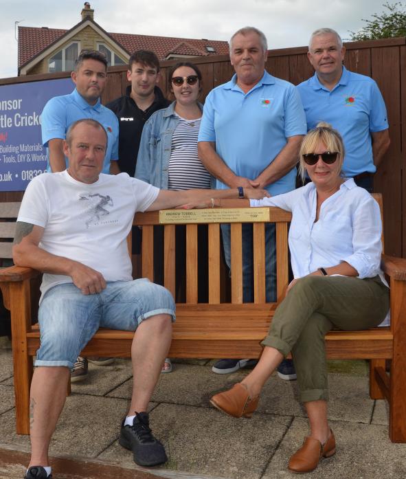 DALE TRIBUTE: A bench dedicated to the memory of popular dale plumber Andrew Tobbell is unveiled to family members. Brother Ian, widow Claire and children Jack and Shannon are pictured with Clique members Matthew Croom, John Bousfield and John Walker