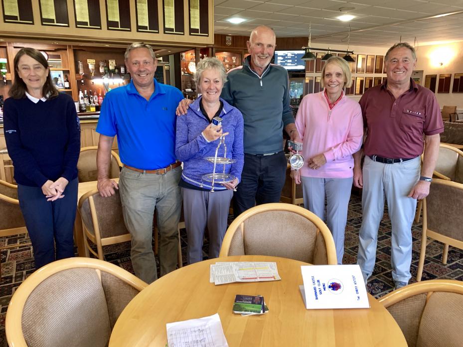 WINNING DUO: Jackson Trophy winners Sue Seddon and Alastair Dinwiddie (centre) scored 38 points in a mixed betterball Stableford to win on countback from Barbara Farrer and Nick Seddon (left).  Dianne Wilkinson and Mike Applegarth (right) came third with