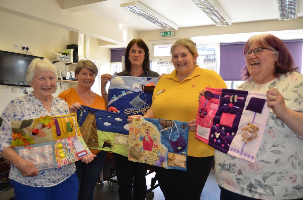 NEW VENTURE: Christine Emerson from Beaconsfield Court Care Home was presented with 30 hand-made fiddle mats for residents by members of Barnard Castle Dementia Friendly Group, from left, Mavis Willoughby, Lesley Taylor, Caroline White and Theresa Atkinso