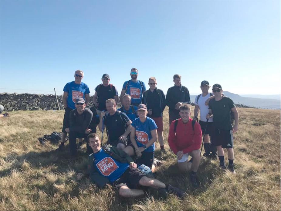 HOWZATT FOR A FUNDRAISER: Members of Aldbrough St John CC on top of on Ingleborough as part of the Three Peaks challenge