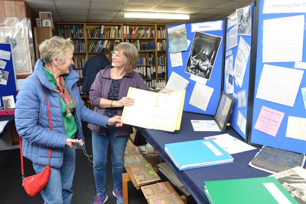 DALE HISTORY: Volunteer Cath Maddison, right, guides Margaret Dent through the exhibition in Middleton-in-Teesdale          TM pic