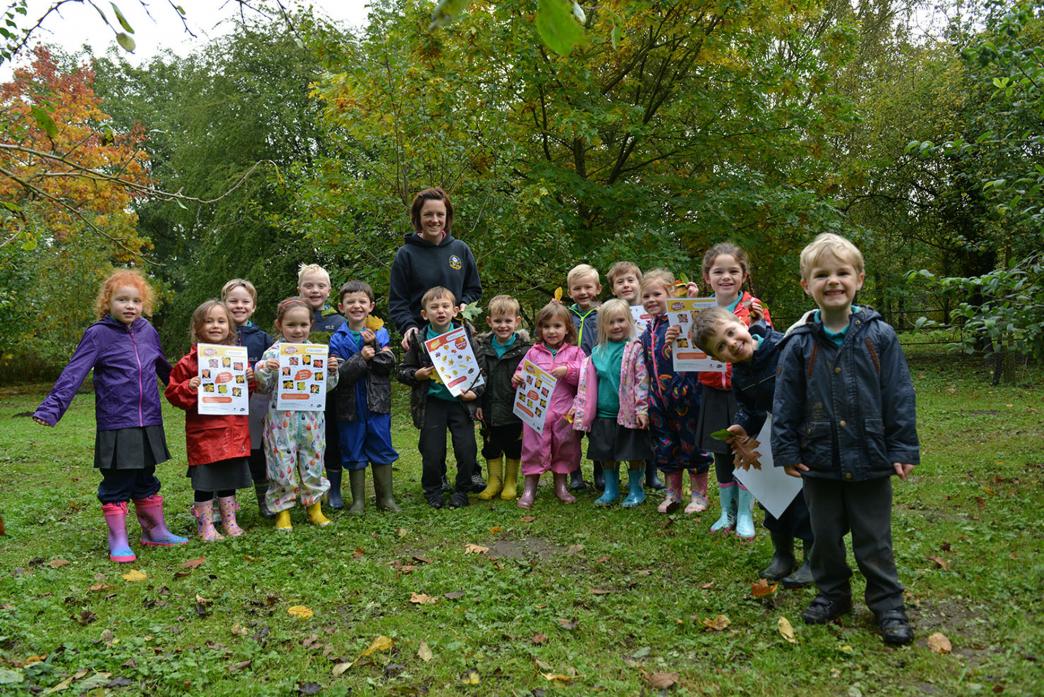 OUT AND ABOUT: Teacher Rachael Muir with pupils from Gainford Primary School as they carry out forest school activities in the village orchard												    TM pic