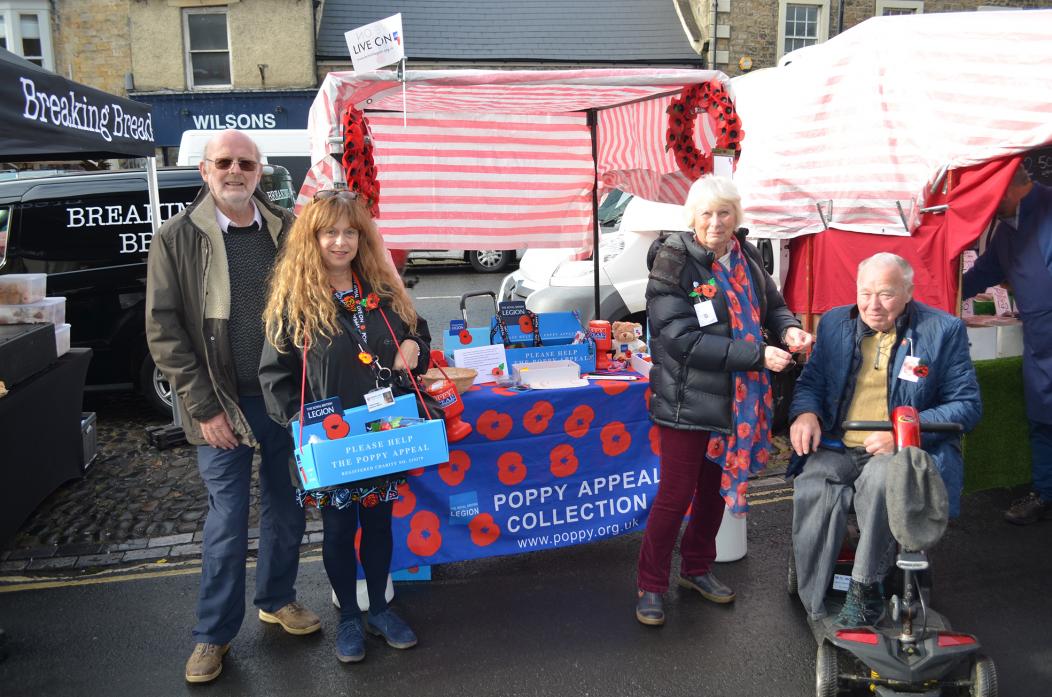 LEST WE FORGET: Deputy town mayor Cllr Frank Harrison, Barnard Castle Town Council services officer Yvette Farren and Cllr Sandra Moorhouse and her husband Ian helped to sell poppies on the town’s market last week