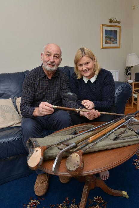 MYSTERY: Astley and Miriam Fenwick inspect the Second World War riding crop they found hidden amongst a set of antique golf clubs. Right, the distinctive crop TM pics