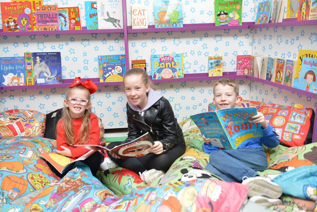 READING ROOM: Ava Dickinson and Bethany and Nathan Pallister enjoyed the comfortable reading nook at The Bowes Museum						             TM pic