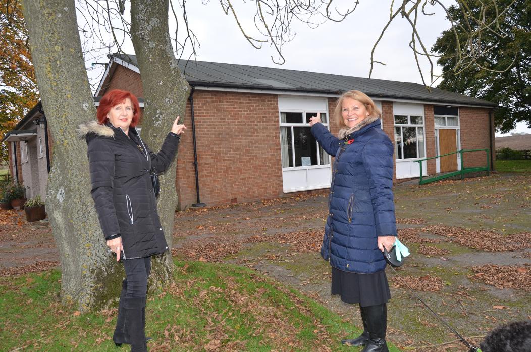 PAST ITS BEST: Yvonne Stonehouse and Barbara Braithwaite are hoping to kick-start fundraising efforts to repair the village hall roof with a retro disco night
