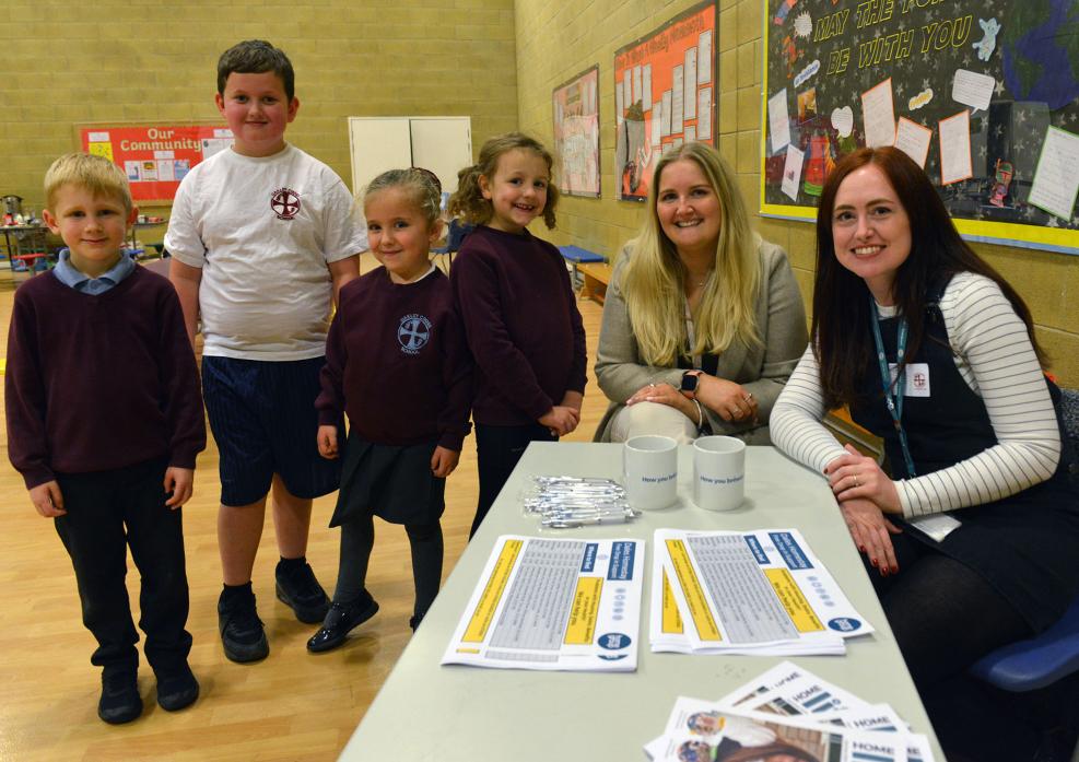 HERE TO HELP: Client services manager of Home Group Sarah Rodrigues explains services available to pupils Rhys White, Riley Blackmore, Amelia-Mae Sowerby and Robyn Graydon, and teacher Charlotte O’Neil