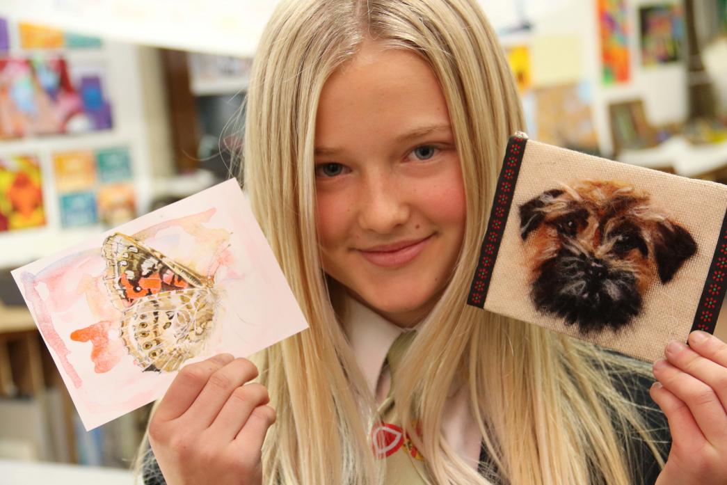 POSTCARD APPEAL Barnard Castle School year nine student Adele Dry, 13, of Barnard Castle, with two of the many postcards donated to raise funds for the We Care charity in Sri Lanka