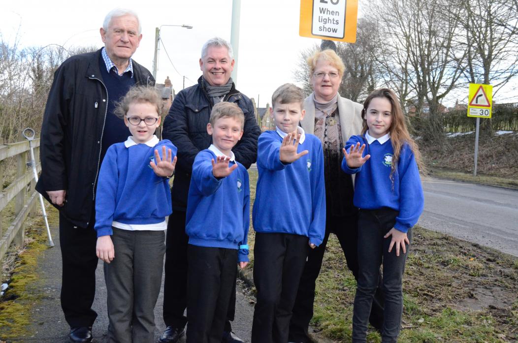 SLOW DOWN: Durham County Councillors Stephen Hugill and Heather Smith with Ramshaw Primary School headteacher Dominic Brown (rear centre), and pupils Isla Howe, Mason Gill, Joel Carline and Paige Geddes who are urging drivers to kill their speed