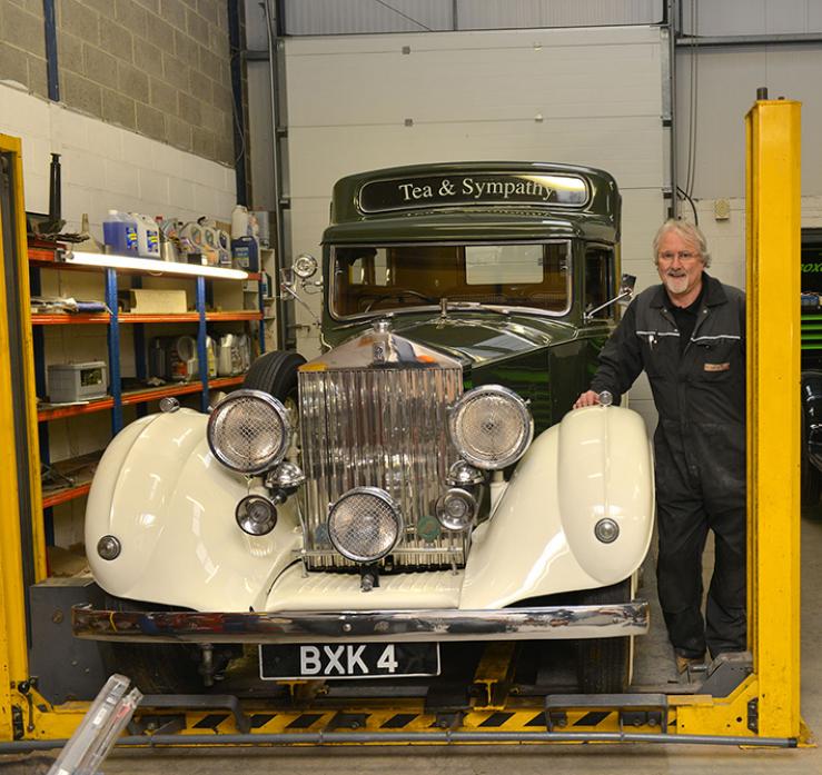 HISTORY CAR: Dick Francis, of Carrosserie, with the iconic Rolls Royce know as Bubbles, which belongs to London’s oldest restaurant Rules. It has been used for big game hunting in Africa and a staff car by the Nazis