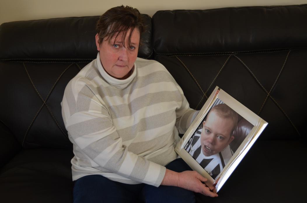 FUNDRAISER: Lisa Wood with a picture of her late son Matthew