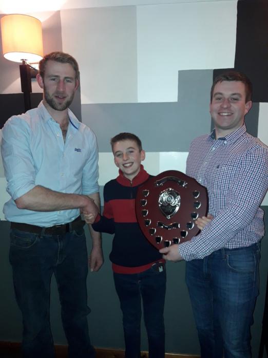 WINNER: Joe Richardson was the first recipient of the Members’ Member of the Year trophy, donated by Mark Harding, left, and Chris Dobinson