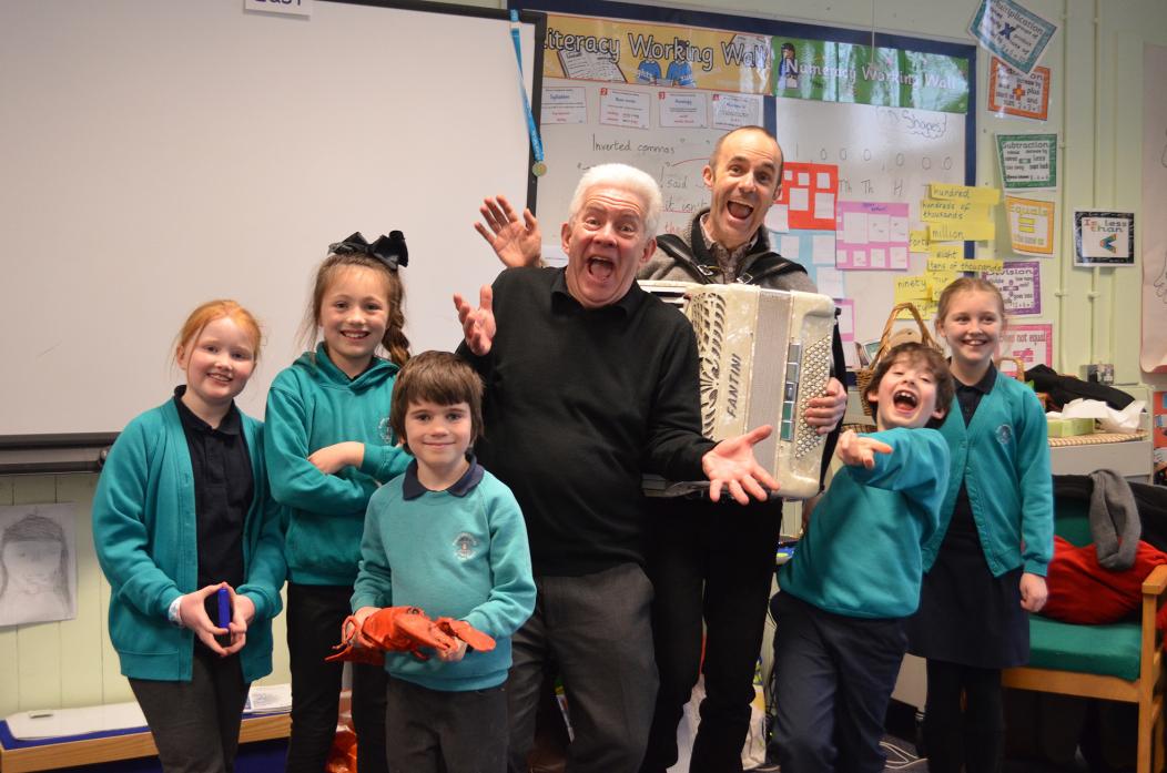 RIGHT NOTE: Poet Ian McMillan and composer Luke Carver Goss dropped by to entertain pupils at Bowes Hutchinson’s Primary School