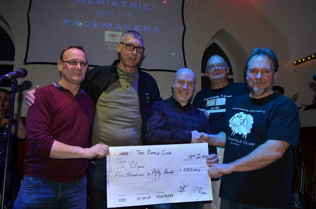 HAND SHAKE: Derek Harper and Phil Ryan from The Pinfold Club hand over a cheque for £550 to members of The Clique Stuart Patterson, Justin Hesp and Bernard O’Brien